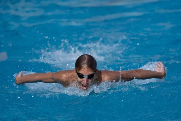 young swimmer training